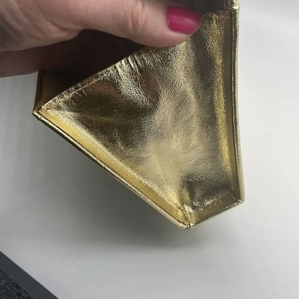 Vintage faux leather gold clutch the rhinestone closure.